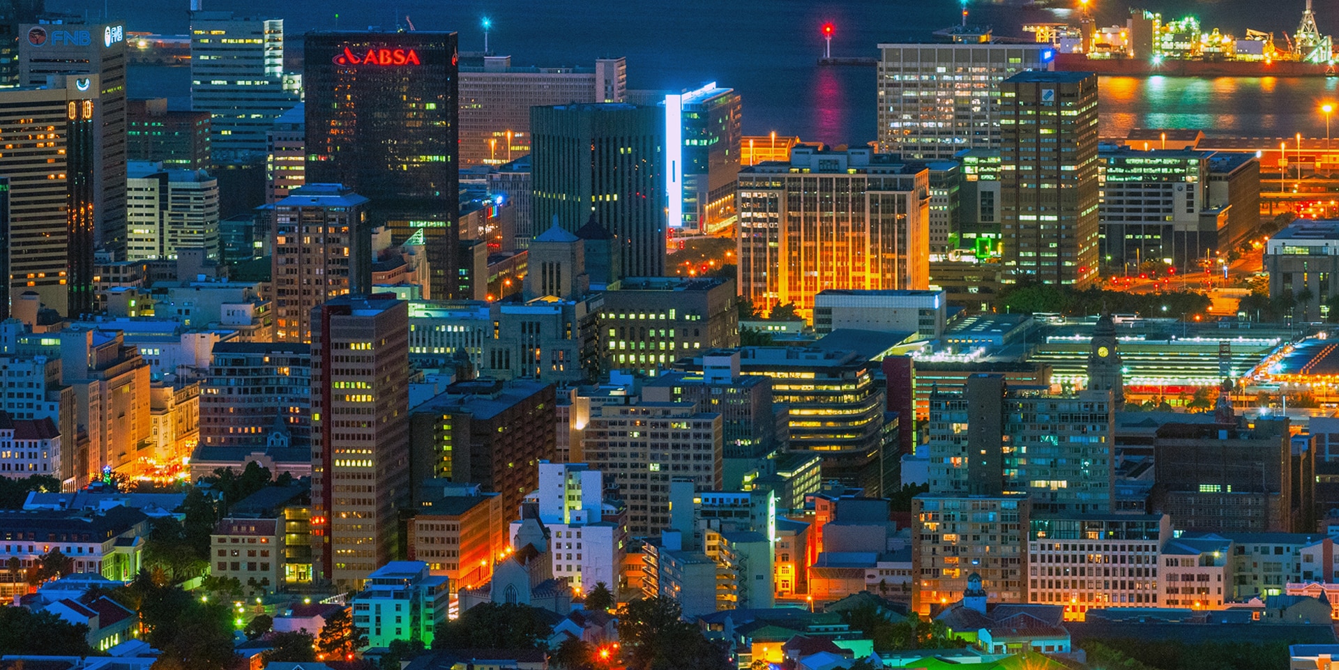 An image of an African capital illuminated at night. 