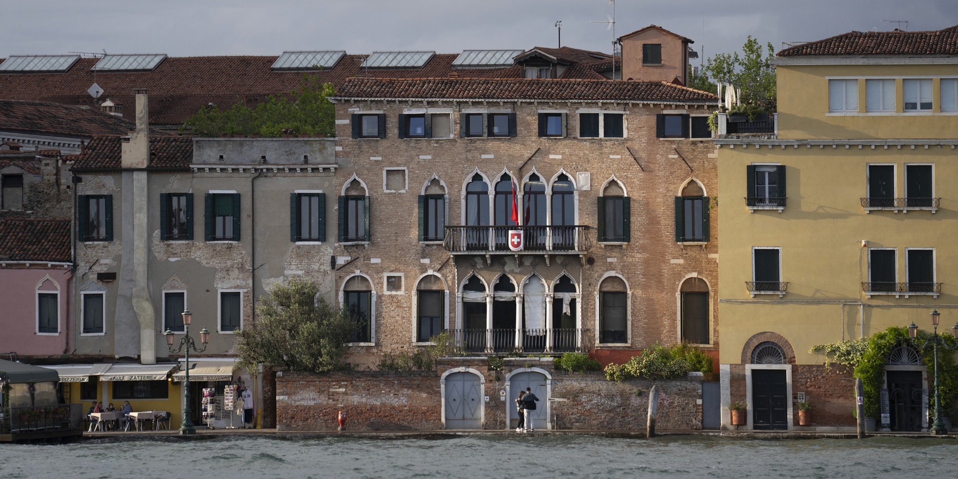 The façade of Palazzo Trevisan from the Zattere waterfront promenade.