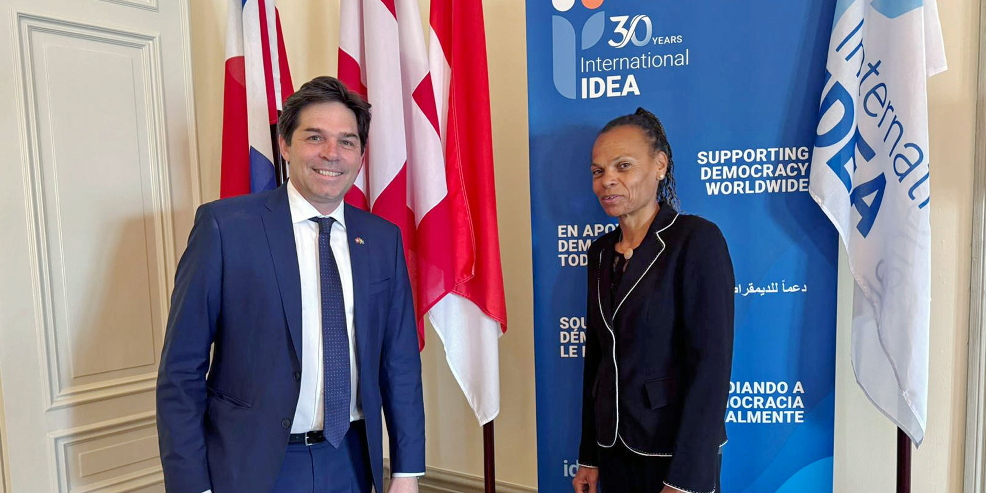 Adrian Junker, Swiss ambassador in Stockholm and chairperson of International IDEA for 2025, standing beside SDC director general Patricia Danzi, who will chair International IDEA's extraordinary council meeting on 12 June.